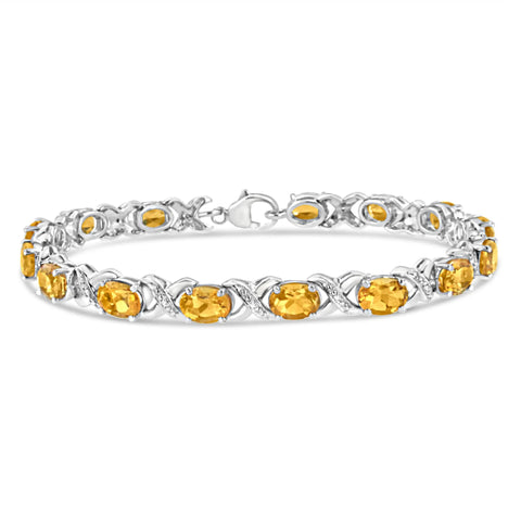 .925 Sterling Silver 7x5 mm Oval Cut Orange Citrine and 1/20 cttw Round Cut Diamond Fashion Tennis Bracelet (I-J Color, I1-I2 Clarity) - 7