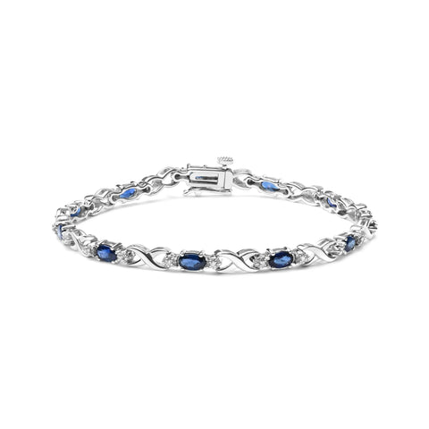 10K White Gold 5x4mm Oval Sapphire Gemstone and 1/10 Cttw Diamond Prong Set 