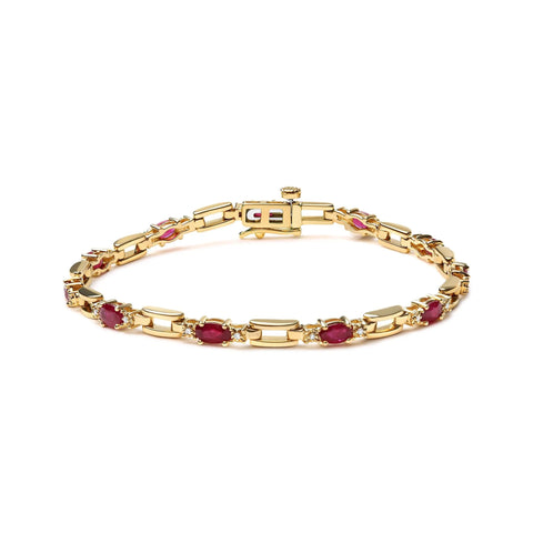 10K Yellow Gold Oval Ruby and 1/10 Cttw Diamond Bar Prong Set Bracelet (H-I Color, SI1-SI2 Clarity)  - Size 7