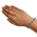 .925 Sterling Silver 21.0 Cttw Created Blue Sapphire and White Topaz Halo Link Bracelet - 7.25 inch