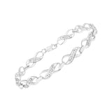 .925 Sterling Silver Prong Set Diamond Accent Ribbon and Infinity Link Bracelet (I-J Color, I3 Clarity) - 7.25"