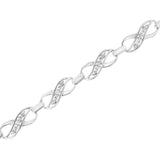 .925 Sterling Silver Prong Set Diamond Accent Ribbon and Infinity Link Bracelet (I-J Color, I3 Clarity) - 7.25"