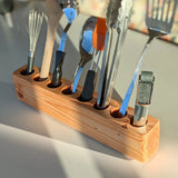 Slot cooking utensil holder