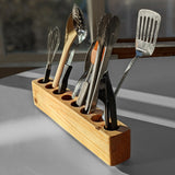 Slot cooking utensil holder